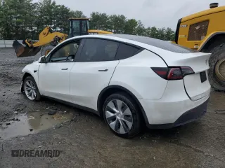 2023 Tesla Model Y Long Range z VIN 7SAYGDEE4PF797653, wystawiony jako Copart lot #58668985 z przebiegiem 35 520 mil mil oraz Szkody całkowita. Historia ofert i sprzedaży dostępna na DreamBid. Obrazek 2.