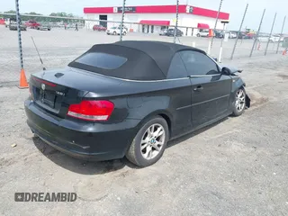 2008 BMW 1 Series 128i with VIN WBAUN13548VH79563, listed as a IAAI auction lot 42186957 with 154,400 mi miles and . Bid and sale history available at carsss.com. Image 4.