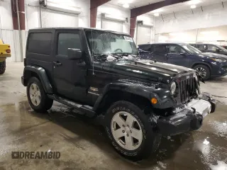 2012 Jeep Wrangler Arctic with VIN 1C4AJWBG3CL164439, listed as a Copart auction lot 88444625 with 189,039 mi miles and Salvage title. Bid and sale history available at DreamBid. Image 4.