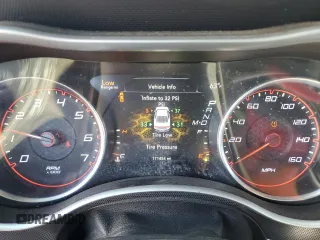 2015 Dodge Charger SXT with VIN 2C3CDXHG9FH856319, listed as a Copart auction lot 57251335 with 171,454 mi miles and Salvage title. Bid and sale history available at DreamBid. Image 9.