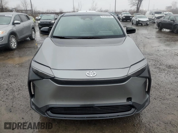 2023 Toyota bZ4X XLE with VIN JTMABACA8PA040484, listed as a Copart auction lot 51410705 with 9,807 mi miles and Salvage Title. Bid and sale history available at DreamBid. Image 5.