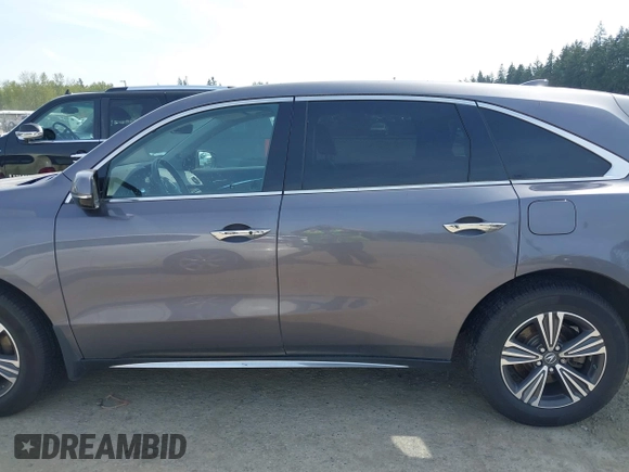 2017 Acura MDX with VIN 5J8YD4H33HL005170, listed as a IAAI auction lot 42131322 with 74,146 mi miles and . Bid and sale history available at DreamBid. Image 15.