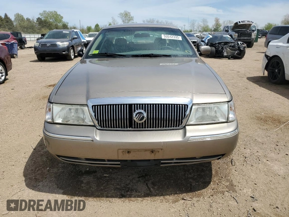 2003 Mercury Grand Marquis GS Convenience z VIN 2MEFM74WX3X619151, wystawiony jako Copart lot #55512335 z przebiegiem 101 627 mil mil oraz Szkoda całkowita • Salvage title. Historia ofert i sprzedaży dostępna na DreamBid. Obrazek 5.