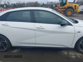 2023 Hyundai Elantra N Line z VIN KMHLR4AFXPU431201, wystawiony jako IAAI lot #41958900 z przebiegiem 38 539 mil mil oraz . Historia ofert i sprzedaży dostępna na DreamBid. Obrazek 13.