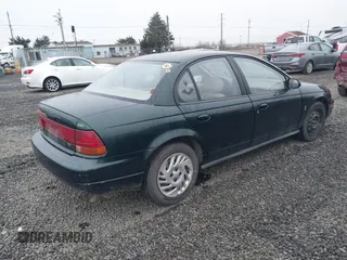 1998 Saturn SL z VIN 1G8ZK5274WZ224248, wystawiony jako IAAI lot #41741929 z przebiegiem 184 972 mil mil oraz . Historia ofert i sprzedaży dostępna na DreamBid. Obrazek 4.