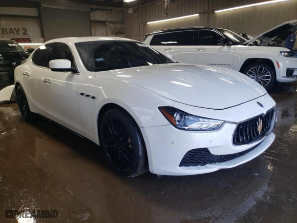 2014 Maserati Ghibli S Q4 with VIN ZAM57RTA4E1117703, listed as a Copart auction lot 48754515 with 104,284 mi miles and Salvage Title. Bid and sale history available at carsss.com. Image 4.
