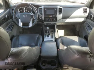 2014 Toyota Tacoma with VIN 3TMLU4EN7EM144839, listed as a Copart auction lot 52728065 with 32,610 mi miles and Salvage Title. Bid and sale history available at DreamBid. Image 8.