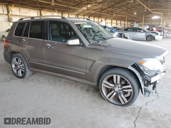 2014 Mercedes-Benz GLK 350 with VIN WDCGG8JB7EG251079, listed as a Copart auction lot 74130584 with 100,252 mi miles and Salvage Title. Bid and sale history available at DreamBid. Image 4.