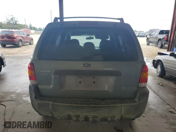 2007 Ford Escape XLS with VIN 1FMYU02Z37KB35521, listed as a Copart auction lot 76533554 with 142,762 mi miles and Salvage Title. Bid and sale history available at carsss.com. Image 6.