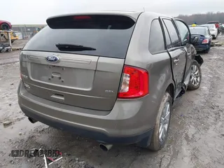 2013 Ford Edge SEL with VIN 2FMDK3JC7DBC80800, listed as a IAAI auction lot 42016037 with 189,746 mi miles. Bid and sale history available at carsss.com. Image 4.
