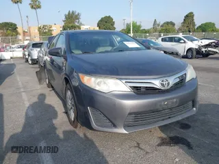 2014 Toyota Camry L with VIN 4T4BF1FK7ER430132, listed as a IAAI auction lot 41912773 with 215,073 mi miles. Bid and sale history available at carsss.com. Image 1.