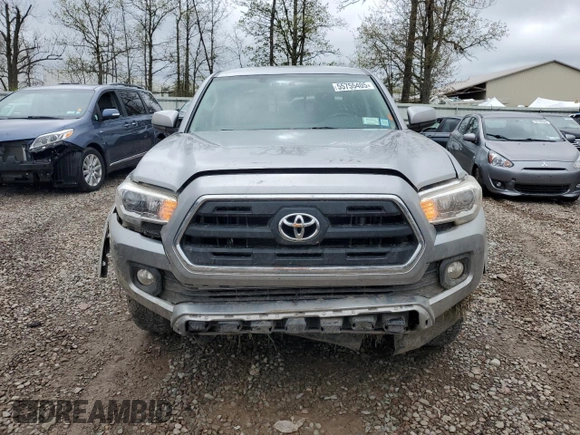2016 Toyota Tacoma SR with VIN 3TMCZ5AN0GM028897, listed as a Copart auction lot 55755405 with 67,346 mi miles and Salvage Title. Bid and sale history available at DreamBid. Image 5.