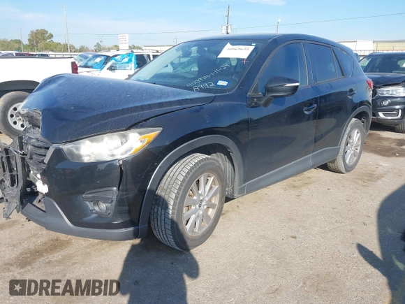 2016 Mazda CX-5 Touring with VIN JM3KE2CY6G0808992, listed as a IAAI auction lot 40969655 with 132,513 mi miles. Bid and sale history available at carsss.com. Image 17.