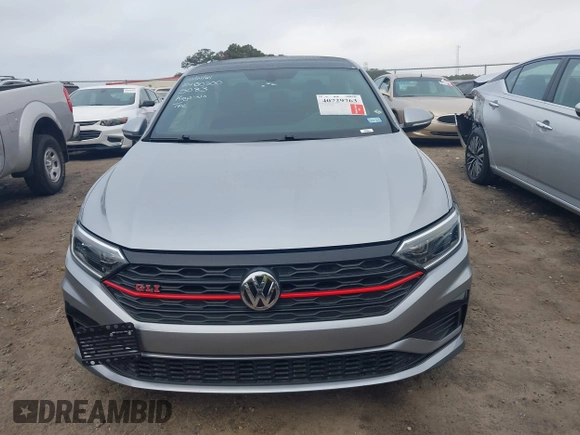 2019 Volkswagen Jetta GLI S z VIN 3VW5T7BU4KM165083, wystawiony jako IAAI lot #40729763 z przebiegiem 75 414 mil mil oraz . Historia ofert i sprzedaży dostępna na DreamBid. Obrazek 12.