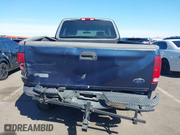 2003 Ford F-150 XL with VIN 1FTRX18WX3NA22323, listed as a IAAI auction lot 41635869 with 129,029 mi miles. Bid and sale history available at carsss.com. Image 16.