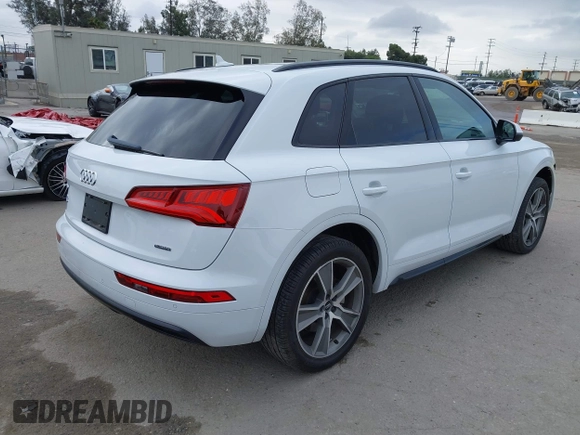 2020 Audi Q5 Premium Plus with VIN WA1BNAFY3L2098991, listed as a IAAI auction lot 42185111 with 94,758 mi miles and . Bid and sale history available at DreamBid. Image 4.
