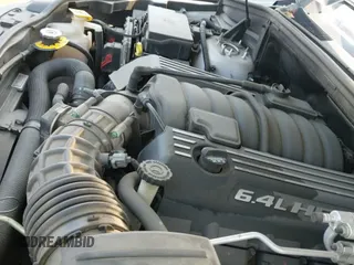 2014 Jeep Grand Cherokee SRT-8 z VIN 1C4RJFDJ1EC512558, wystawiony jako IAAI lot #43102961 z przebiegiem 63 307 mil mil oraz . Historia ofert i sprzedaży dostępna na DreamBid. Obrazek 20.