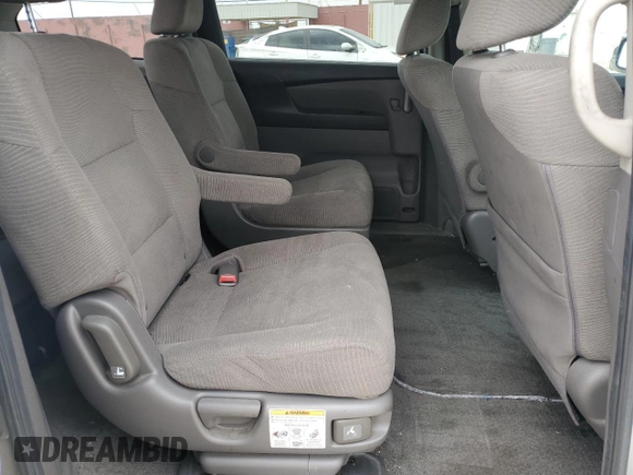 2013 Honda Odyssey LX z VIN 5FNRL5H22DB039777, wystawiony jako Copart lot #59398315 z przebiegiem 228 528 mil mil oraz Czysty tytuł • Clean title. Historia ofert i sprzedaży dostępna na DreamBid. Obrazek 11.