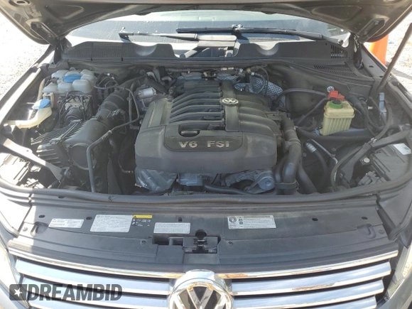 2016 Volkswagen Touareg Sport с VIN WVGEF9BP1GD012594, выставлен на аукционе Copart как лот 52438305 с пробегом 125 204 миль миль и Списание • Salvage title. История ставок и продаж доступна на DreamBid. Изображение 12.