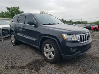 2011 Jeep Grand Cherokee Laredo with VIN 1J4RR4GG6BC669375, listed as a Copart auction lot 61526885 with 154,727 mi miles and Clean title. Bid and sale history available at DreamBid. Image 4.