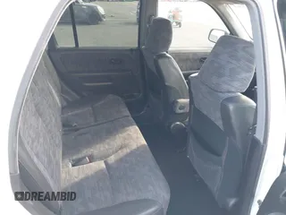 2004 Honda CR-V LX with VIN JHLRD68464C003417, listed as a IAAI auction lot 40475563 with 251,729 mi miles and . Bid and sale history available at DreamBid. Image 8.