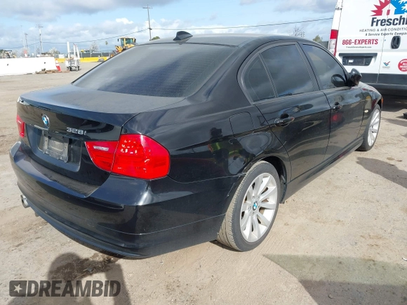 2011 BMW 3 Series 328i with VIN WBAPH5C5XBF216401, listed as a IAAI auction lot 41890987 with 114,698 mi miles and . Bid and sale history available at carsss.com. Image 4.