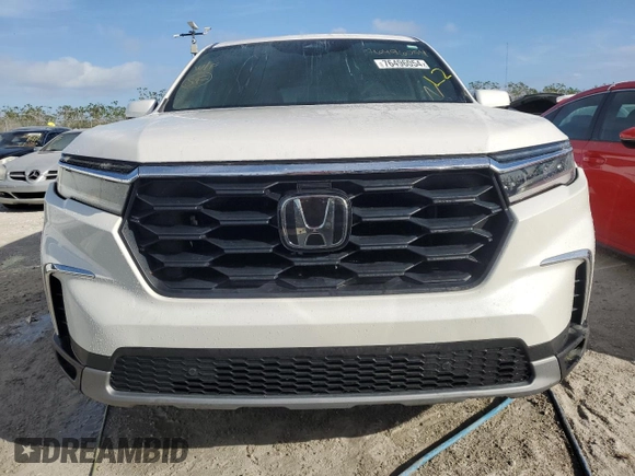 2023 Honda Pilot EX-L 8 Passenger with VIN 5FNYG2H48PB012667, listed as a Copart auction lot 76496054 with 0 mi miles and Non Repairable. Bid and sale history available at carsss.com. Image 5.