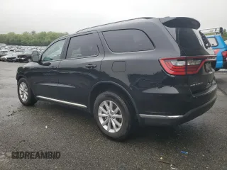 2023 Dodge Durango SXT with VIN 1C4RDHAG5PC634936, listed as a Copart auction lot 57282195 with 56,689 mi miles and Salvage title. Bid and sale history available at DreamBid. Image 2.