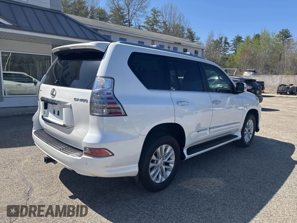 2014 Lexus GX with VIN JTJBM7FX1E5090308, listed as a IAAI auction lot 42130546 with 132,247 mi miles. Bid and sale history available at carsss.com. Image 4.