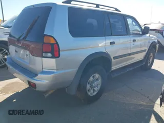 2003 Mitsubishi Montero Sport ES with VIN JA4LS21H13J011931, listed as a IAAI auction lot 41847642 with 113,559 mi miles. Bid and sale history available at carsss.com. Image 4.