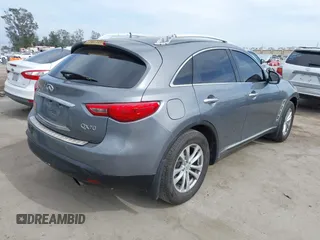 2014 Infiniti QX70 with VIN JN8CS1MU8EM450428, listed as a IAAI auction lot 42233727 with 88,342 mi miles and . Bid and sale history available at DreamBid. Image 4.