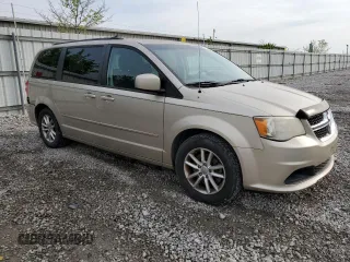 2014 Dodge Grand Caravan SXT z VIN 2C4RDGCG1ER214411, wystawiony jako Copart lot #55497065 z przebiegiem 176 662 mil mil oraz Czysty tytuł • Clean title. Historia ofert i sprzedaży dostępna na DreamBid. Obrazek 4.