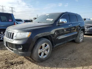 2012 Jeep Grand Cherokee Limited z VIN 1C4RJFBT8CC171094, wystawiony jako Copart lot #49227825 z przebiegiem 165 520 mil mil oraz Szkoda całkowita • Salvage title. Historia ofert i sprzedaży dostępna na DreamBid. Obrazek 1.