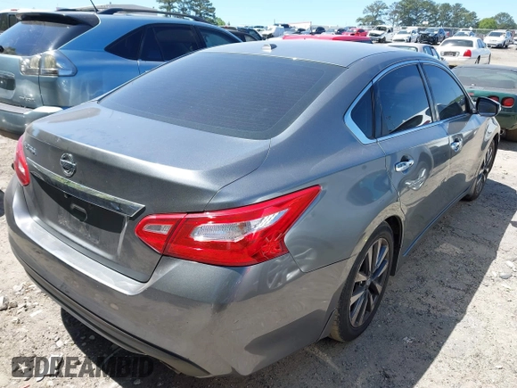 2016 Nissan Altima SR with VIN 1N4AL3AP0GC132991, listed as a IAAI auction lot 42058890 with 185,597 mi miles and . Bid and sale history available at carsss.com. Image 4.