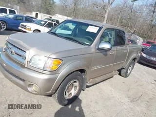 2004 Toyota Tundra SR5 with VIN 5TBET34144S447959, listed as a IAAI auction lot 41752378 with 301,993 mi miles and . Bid and sale history available at DreamBid. Image 2.
