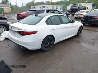 2021 Alfa Romeo Giulia Ti Sport with VIN ZARFAMBN9M7640461, listed as a IAAI auction lot 42329442 with 43,266 mi miles and . Bid and sale history available at DreamBid. Image 4.