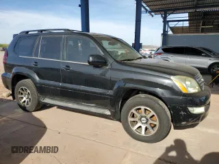 2005 Lexus GX 470 with VIN JTJBT20X450071179, listed as a Copart auction lot 56757415 with 194,709 mi miles and Clean Title. Bid and sale history available at DreamBid. Image 4.