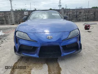 2023 Toyota Supra 3.0 with VIN WZ1DB0G08PW061526, listed as a Copart auction lot 61642655 with 11,279 mi miles and Salvage title. Bid and sale history available at DreamBid. Image 5.