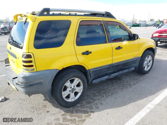 2003 Ford Escape XLT Popular 2 with VIN 1FMCU93153KC03710, listed as a IAAI auction lot 41834521 with 168,027 mi miles. Bid and sale history available at carsss.com. Image 4.