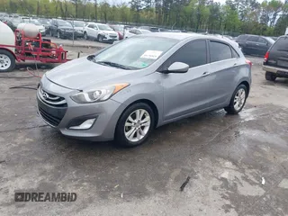2013 Hyundai Elantra GT with VIN KMHD35LE1DU058318, listed as a IAAI auction lot 42036716 with 146,845 mi miles. Bid and sale history available at carsss.com. Image 2.