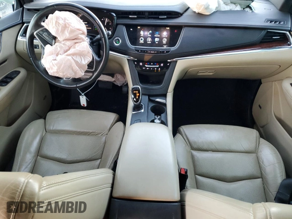 2017 Cadillac XT5 Luxury FWD with VIN 1GYKNBRS0HZ196145, listed as a Copart auction lot 83430344 with 143,012 mi miles and Salvage title. Bid and sale history available at DreamBid. Image 8.