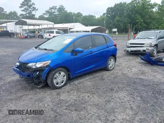 2020 Honda Fit LX with VIN 3HGGK5H43LM723115, listed as a IAAI auction lot 42486064 with 31,787 mi miles and . Bid and sale history available at DreamBid. Image 2.
