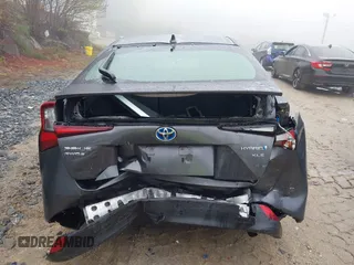 2021 Toyota Prius LE z VIN JTDL9MFU5M3023704, wystawiony jako IAAI lot #42190887 z przebiegiem 45 711 mil mil oraz . Historia ofert i sprzedaży dostępna na DreamBid. Obrazek 17.