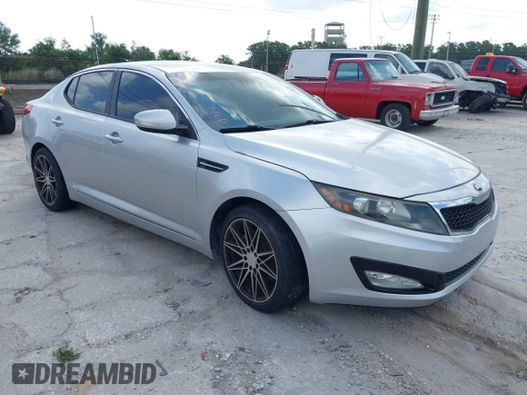2013 Kia Optima LX with VIN KNAGM4A75D5380478, listed as a IAAI auction lot 42153829 with 82,845 mi miles. Bid and sale history available at carsss.com. Image 1.