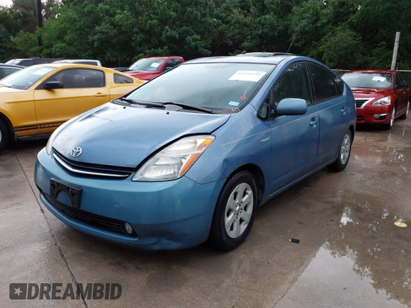 2007 Toyota Prius with VIN JTDKB20U777629371, listed as a IAAI auction lot 42160240 with 171,984 mi miles. Bid and sale history available at carsss.com. Image 2.