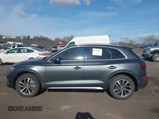 2023 Audi Q5 S line Premium Plus z VIN WA1EAAFY5P2133268, wystawiony jako IAAI lot #42043262 z przebiegiem 21 664 mil mil oraz . Historia ofert i sprzedaży dostępna na DreamBid. Obrazek 14.