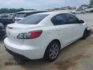 2011 Mazda Mazda3 i Sport with VIN JM1BL1UFXB1453950, listed as a IAAI auction lot 42180303 with 228,154 mi miles. Bid and sale history available at carsss.com. Image 4.