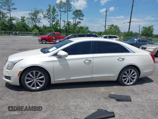 2013 Cadillac XTS Luxury with VIN 2G61P5S38D9160016, listed as a IAAI auction lot 42192602 with 134,879 mi miles and . Bid and sale history available at DreamBid. Image 14.