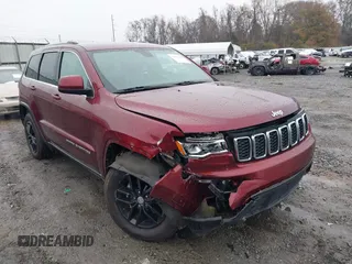 2018 Jeep Grand Cherokee Laredo E with VIN 1C4RJEAG6JC304608, listed as a IAAI auction lot 41421010 with 178,708 mi miles and . Bid and sale history available at DreamBid. Image 6.