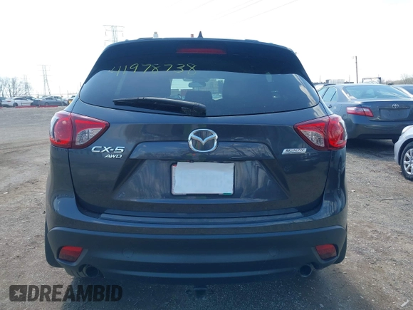2016 Mazda CX-5 Touring with VIN JM3KE4CYXG0620990, listed as a IAAI auction lot 41978738 with 91,237 mi miles and . Bid and sale history available at carsss.com. Image 16.